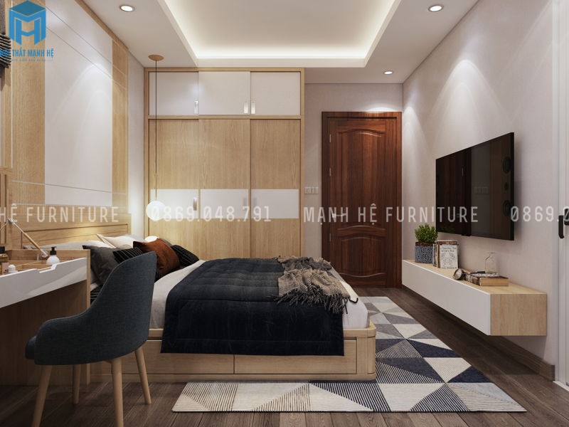 Toàn bộ nội thất phòng ngurlafm bằng gỗ công nghiệp. Chiếc giường tận dụng tường làm thành giường và có các ngăn kéo giúp tiết kiệm không gian tối đa