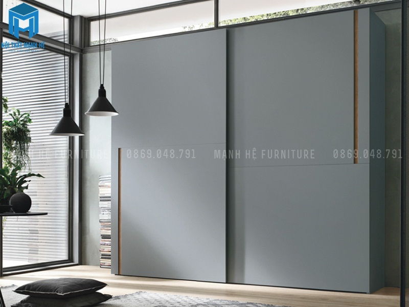 Tủ quần áo cánh trượt được tráng acrylic màu xanh ngọc sang trọng, mỗi cánh rộng co bạn thoải mái chứa đựng cả kho quần áo thỏa thích.