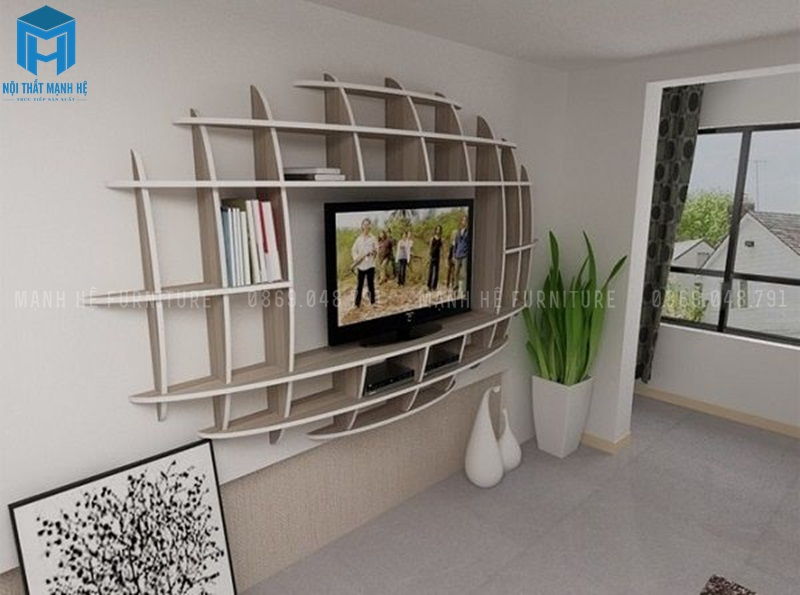 Kệ treo tường được thiết kế hình cung đang xen nhau đẹp mắt, kết hợp làm kệ ti vi khá tiện lợi