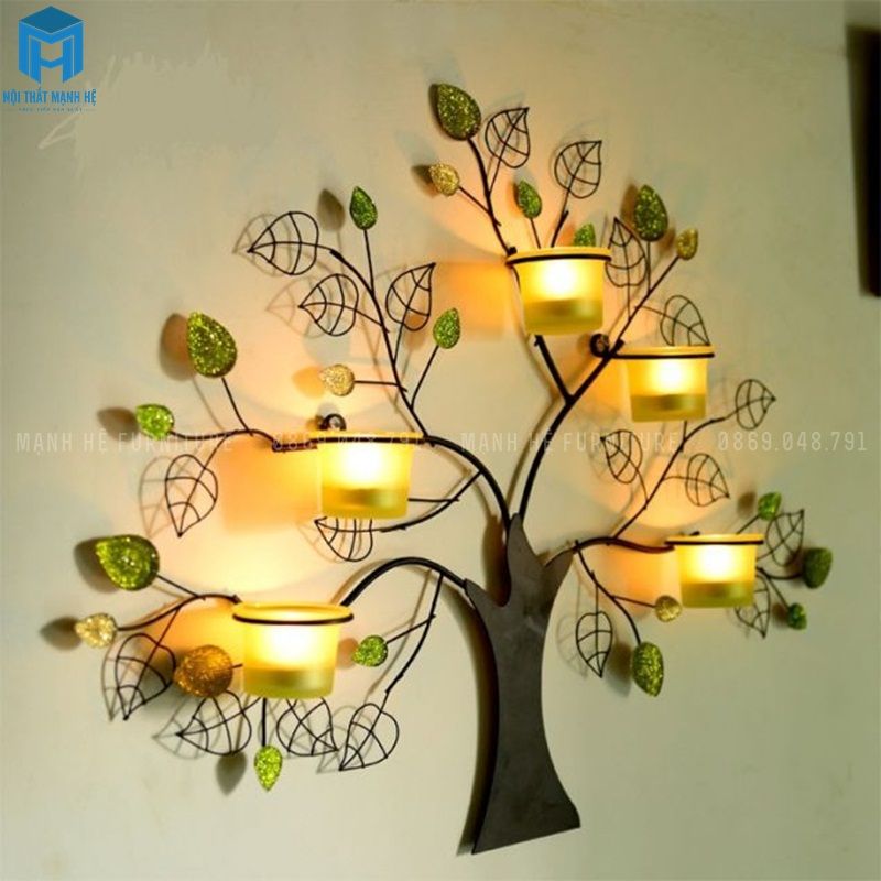 Cây handmade đơn giản, dễ làm, sử dụng những sợi thép, lá nhựa giả, đèn sợi tóc làm nên hình tượng chiếc cây vô cùng ấn tượng