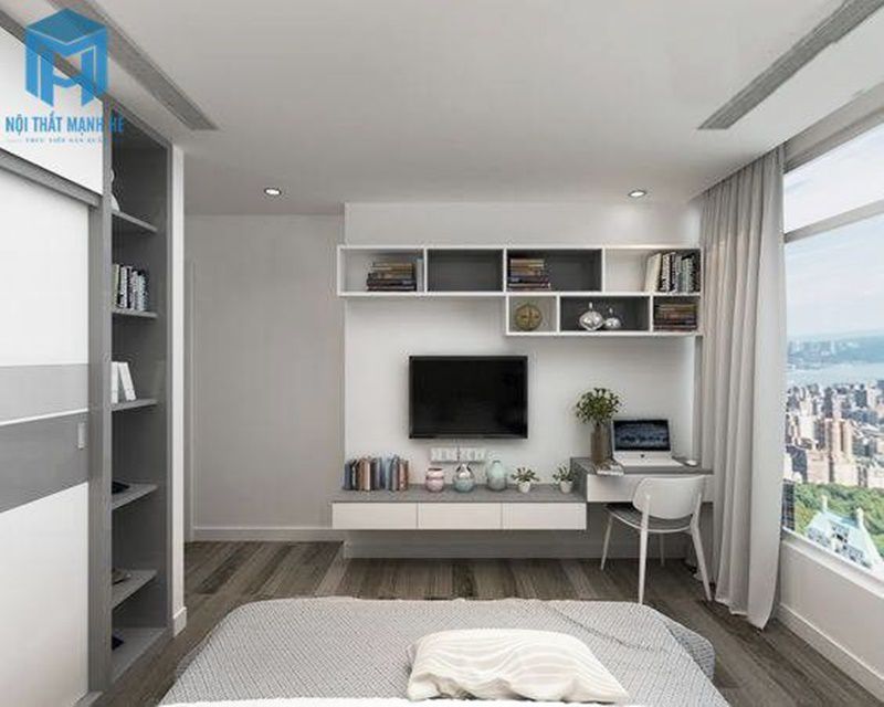 Kệ gỗ tivi treo tường nối liền bàn làm việc
