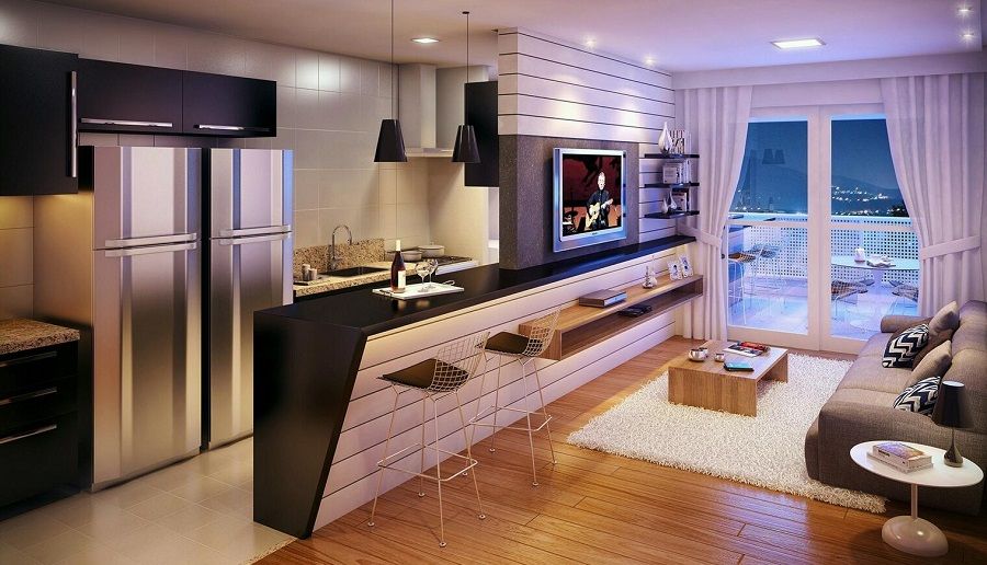 Quầy bar ngăn cách bếp và phòng khách trở thành điểm nhấn nổi bật với thiết kế cách điệu