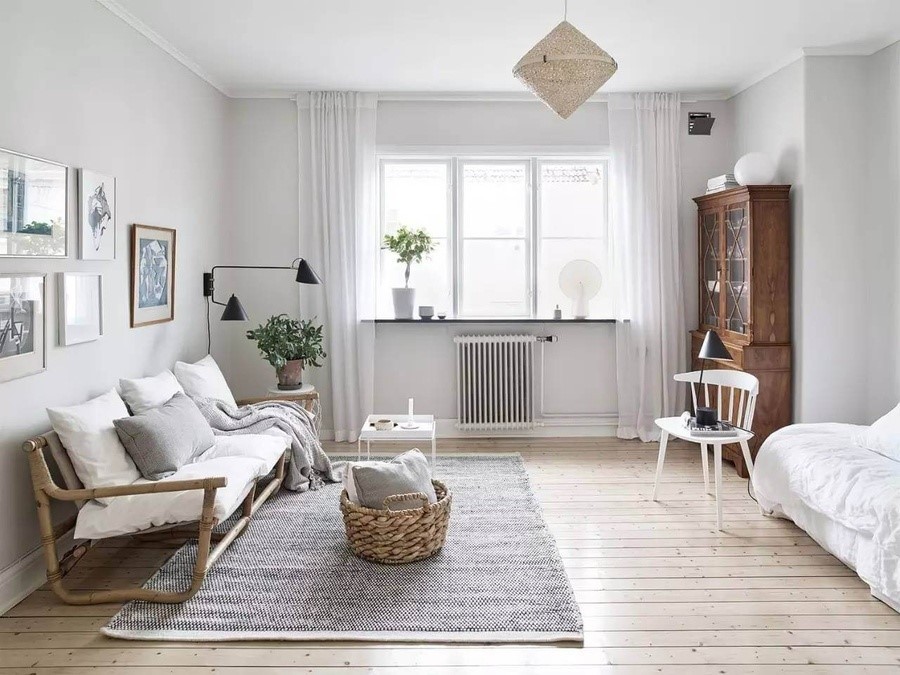 Không gian phòng khách nhỏ sử dụng đồ nội thất đơn giản mộc mạc