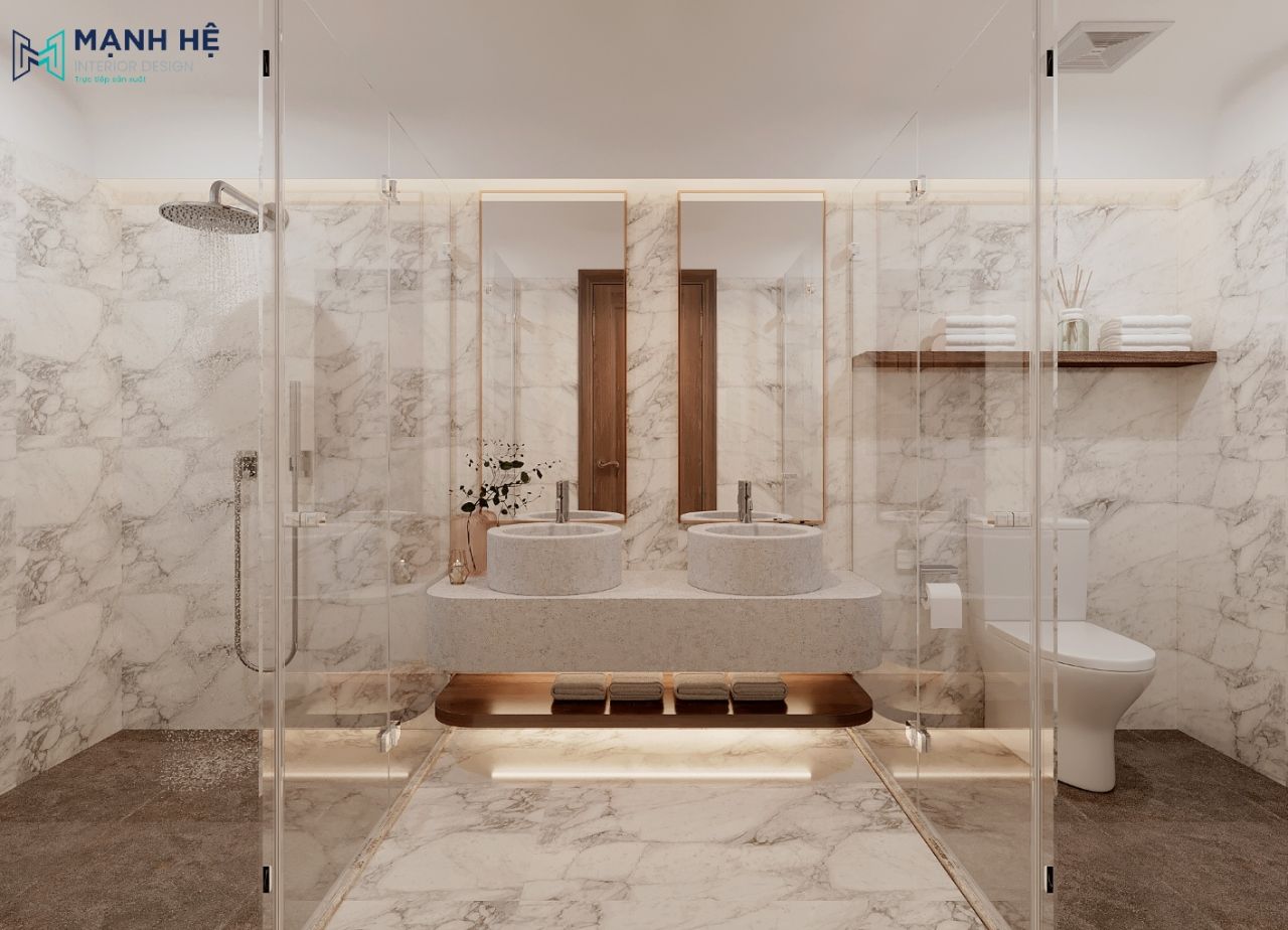 Phòng tắm thiết kế với lavabo đôi được ngăn cách với bồn vệ sinh và phòng tắm đứng với tone màu trắng vân đá sang trọng