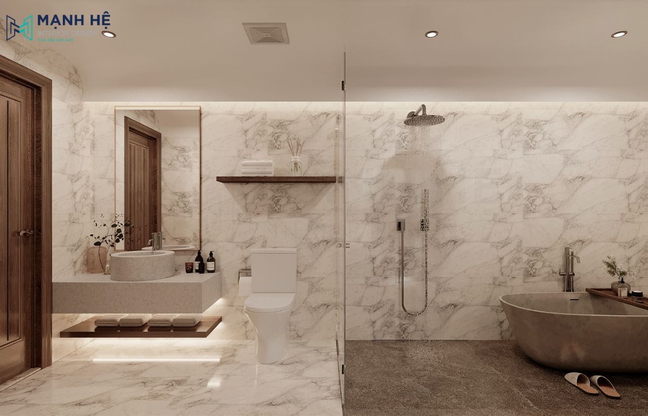 Phòng tắm thiết kế với lavabo đôi được ngăn cách với bồn vệ sinh và phòng tắm đứng với tone màu trắng vân đá sang trọng