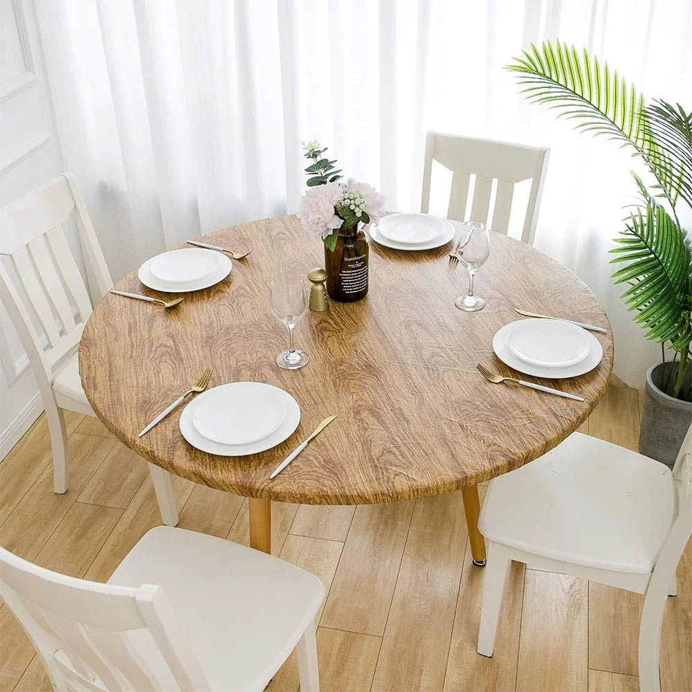 Bàn ăn tròn gỗ công nghiệp với vân tự nhiên kết hợp bộ ghế màu trắng tinh khiết