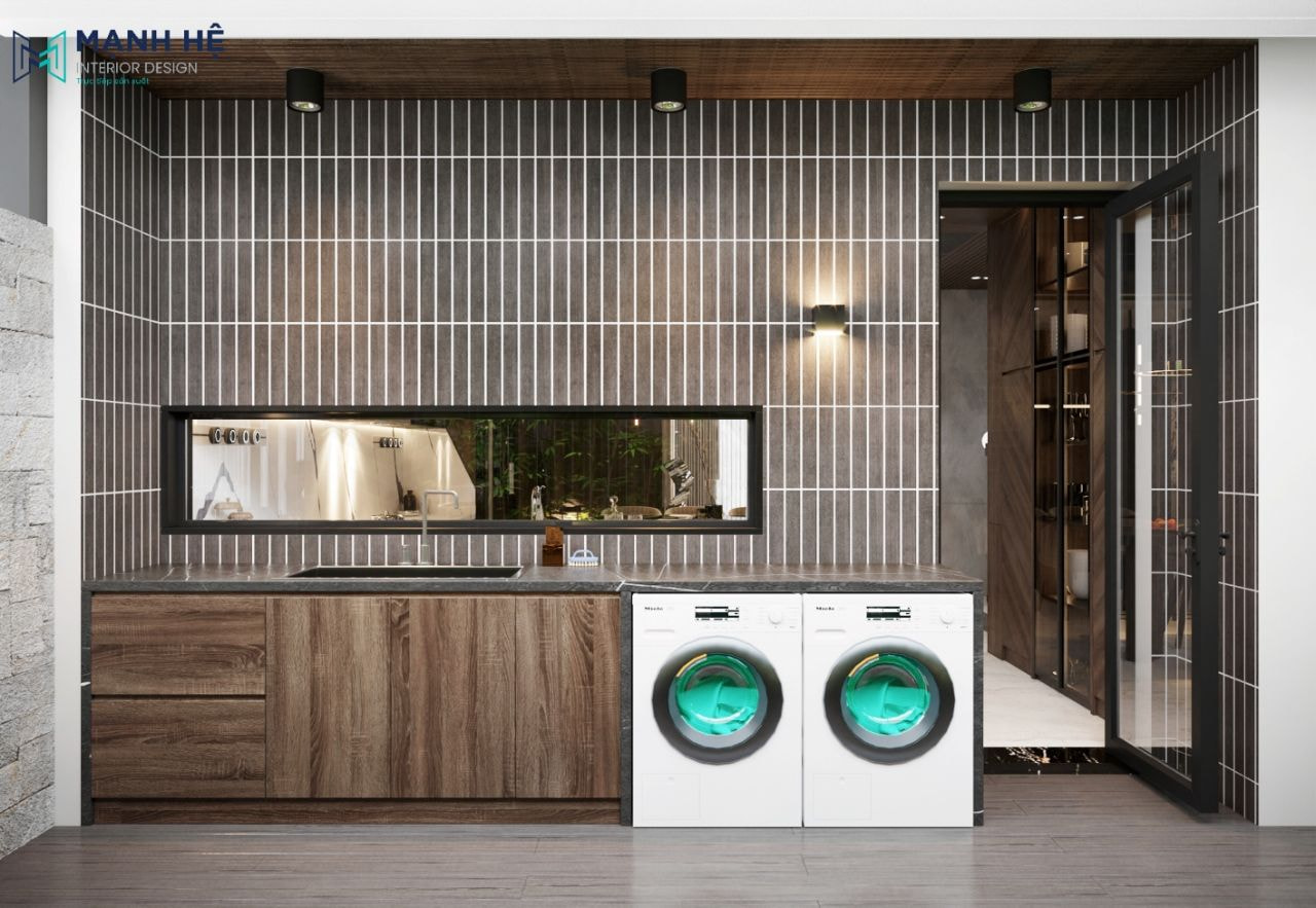 Ốp gạch cao cấp cho phần tường khu vực này, sử dụng tủ đựng đồ gỗ công nghiệp tích hợp máy giặt