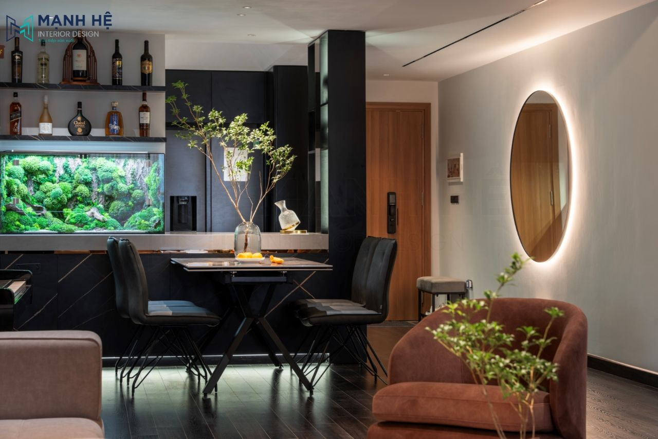 Không gian phòng bếp liền phòng khách với bàn ăn đặt chính giữa