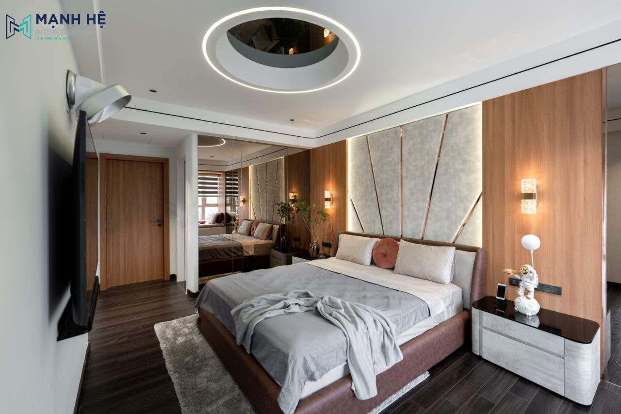 Vách kính thủy ốp tường giúp tạo chiều sâu cho không gian phòng ngủ