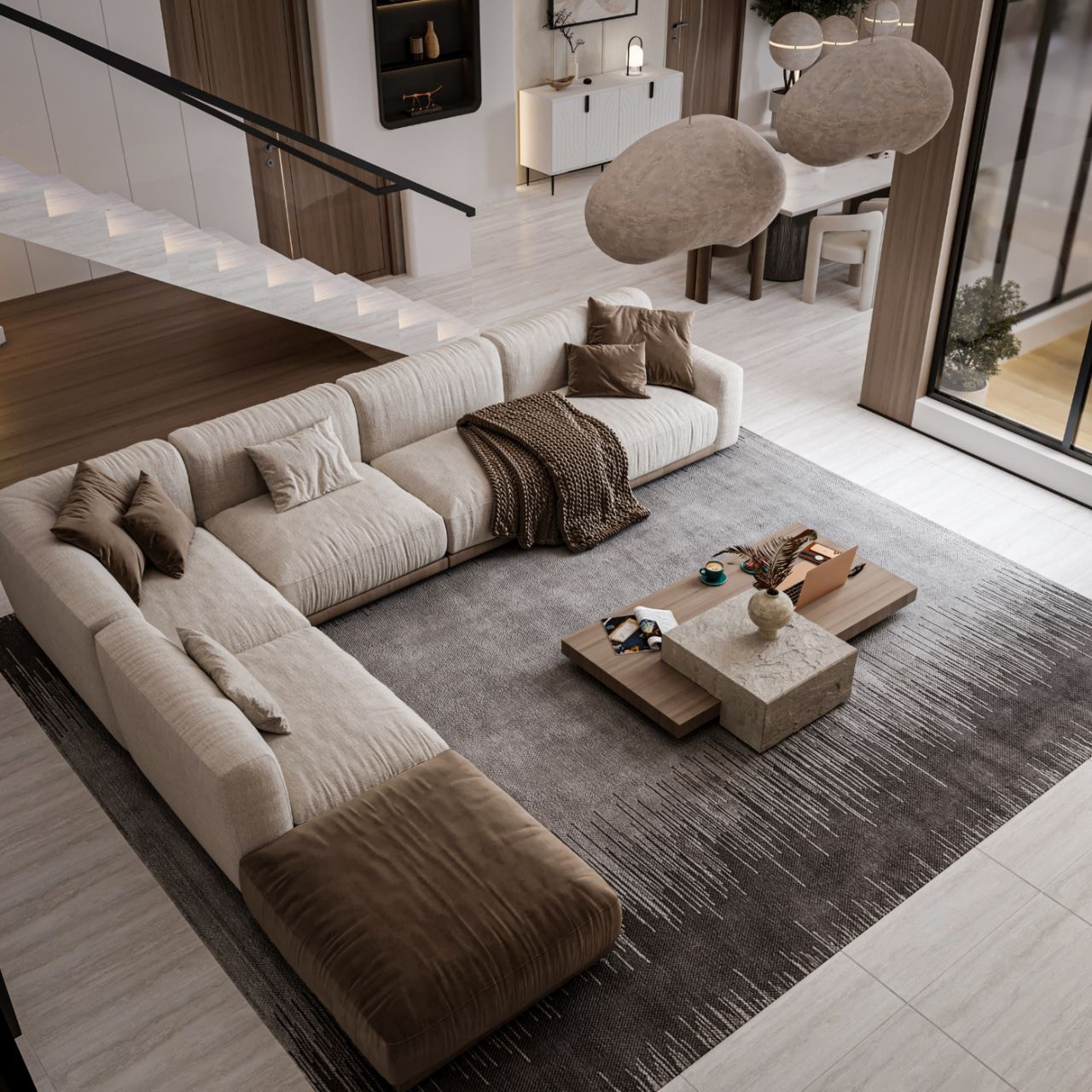 Phòng khách có cầu thang đặt ngay bên cạnh ghế sofa và bàn trà