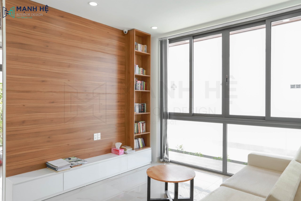 7. Vách ốp Gỗ Sau Kệ Tivi Phòng Khách Phụ Thi công kệ tivi kết hợp kệ sách tại sảnh phòng khách phụ