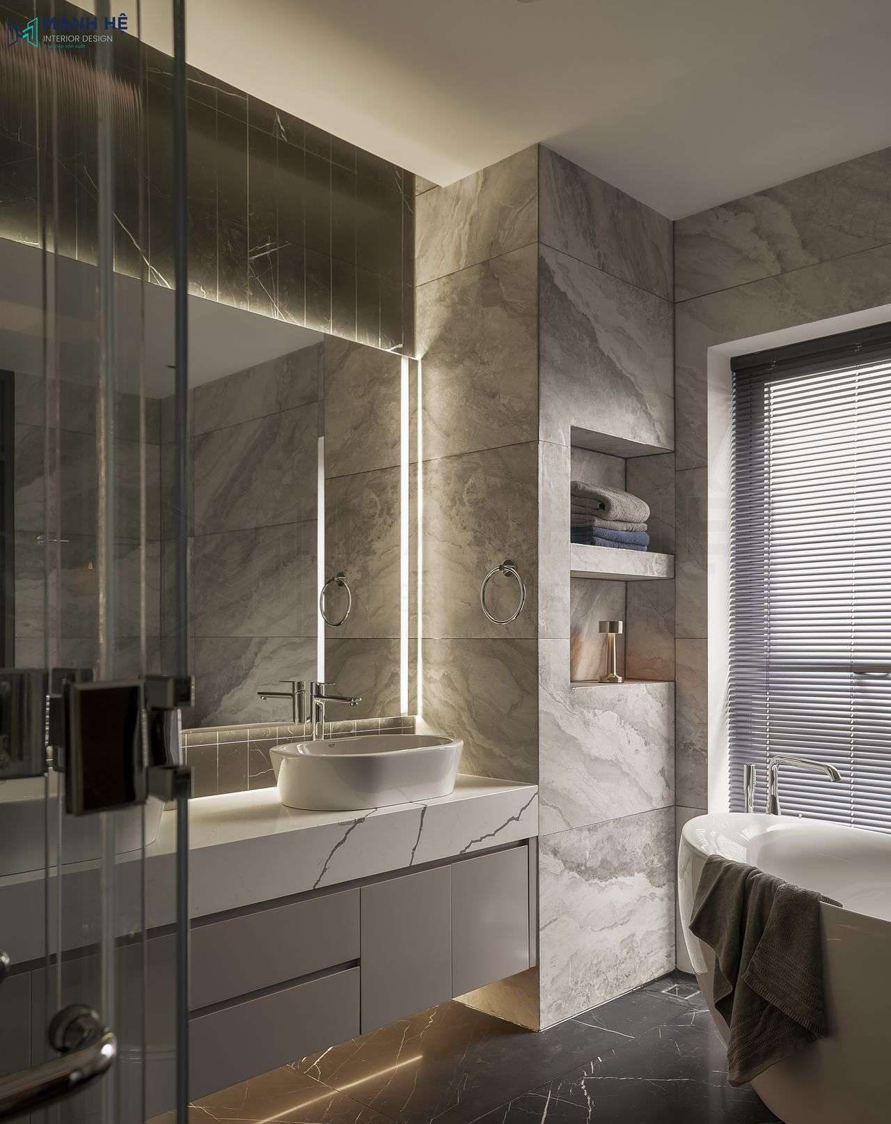 Khu vực bồn rửa mặt được lắp đặt đèn ở gương tạo sự tươi sáng