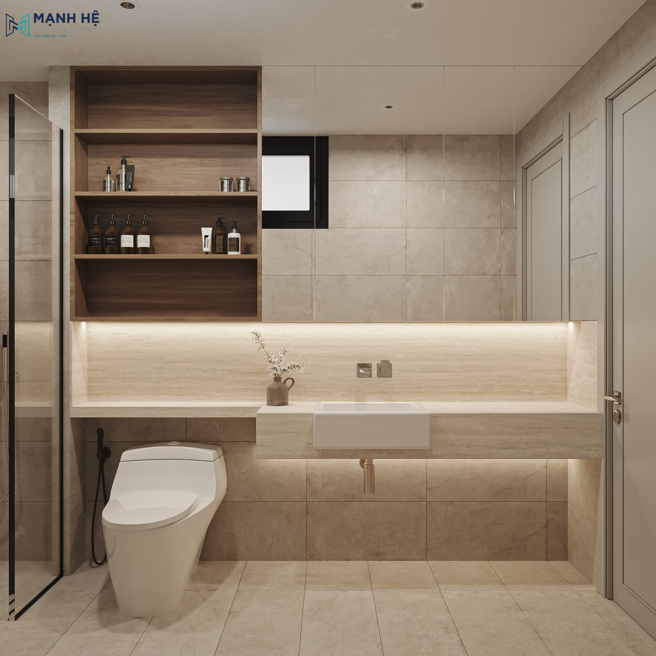 Phòng toilet thiết kế với gam màu trung tính, đặt tấm kính lớn để mở rộng không gian, lựa chọn kệ gỗ 4 tầng để lưu trữ đồ dùng, ngăn cách khu vực tắm với tấm kính.