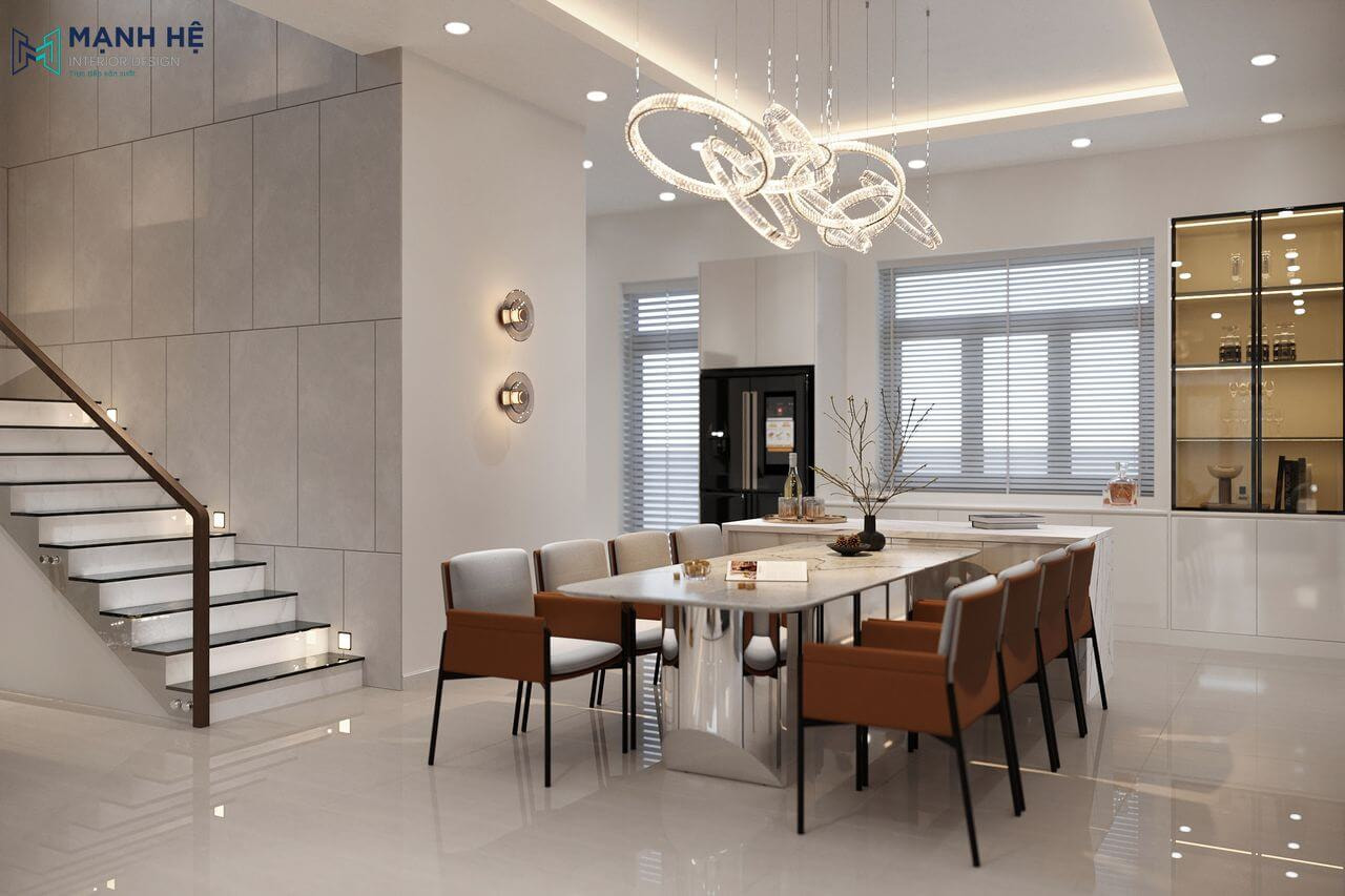 Bàn ăn rộng rãi với sức chứa cho 8 người được bố trí gọn gàng và tinh tế kết hợp cùng đèn thả bàn ăn với ánh sáng dịu nhẹ ấm cúng