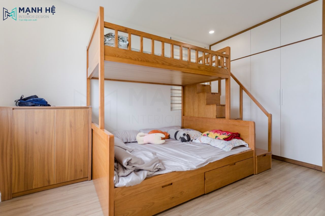 Thi Cong Noi That Chung Cu Phòng ngủ các bé được thiết kế theo phong cách đơn giản với tone gỗ chủ đạo