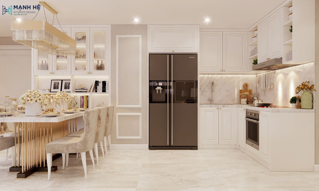 Khu vực bếp chữ L được làm từ gỗ công nghiệp giúp tối ưu không gian và sử dụng gam màu trắng đồng nhất với căn phòng