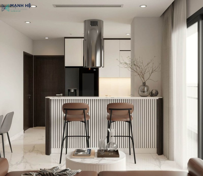 Thiết kế quầy bar như một vách ngăn phân chia không gian bếp và phòng khách một cách tinh tế, với mặt bàn được ốp đá marble sang trong