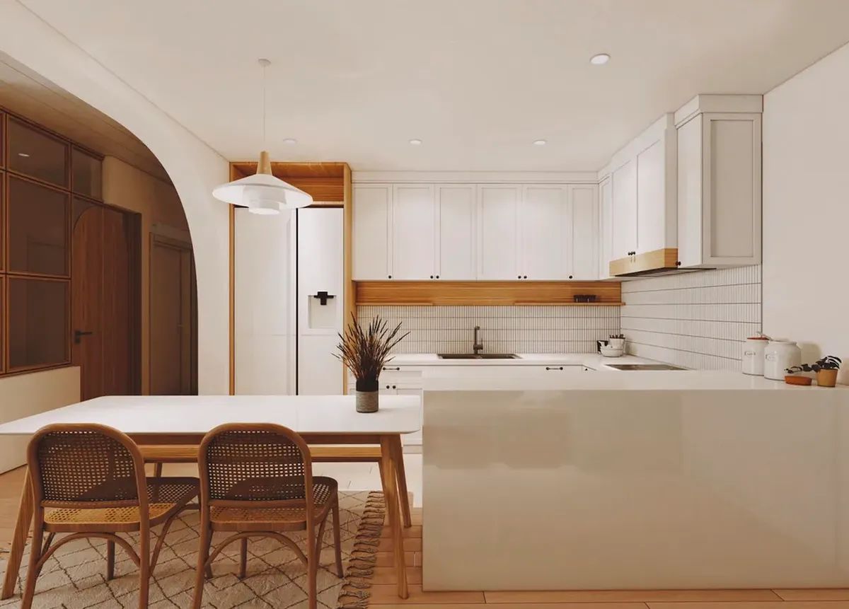 Phòng bếp Scandinavian được tôn lên vẻ ấm cúng với chất liệu gỗ tự nhiên được sử dụng đồng bộ và có thêm điểm nhấn ở chậu cây nhỏ giúp không gian thêm sinh động