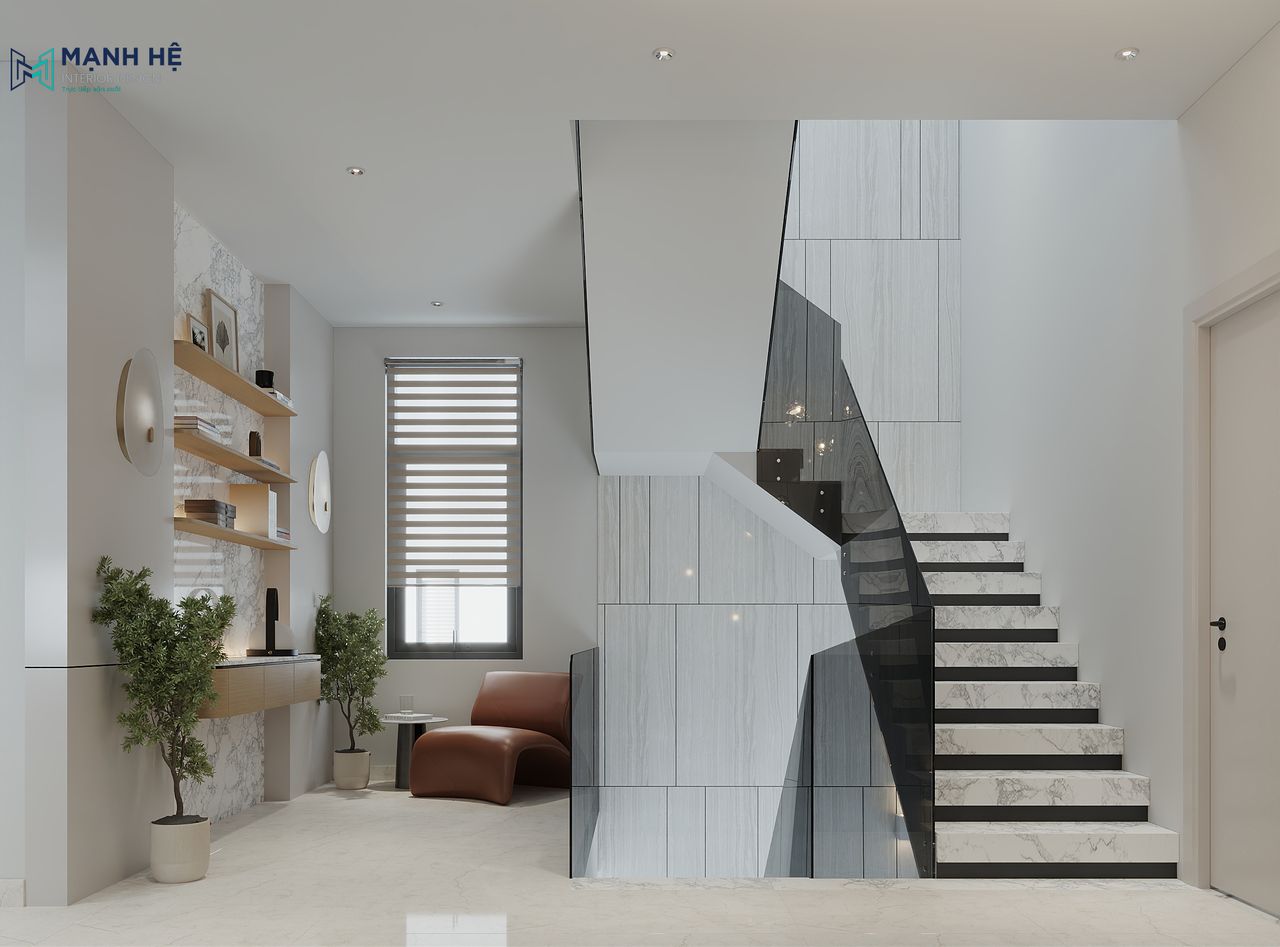 Khu vực sảnh tầng 1 được bố trí góc đọc sách, thư giãn bên cạnh cửa sổ