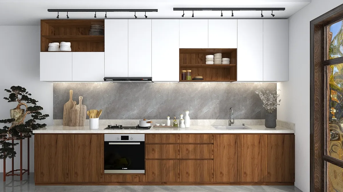 Thiết kế nhà bếp mang tinh thần Zen với các đường vân gỗ tạo nên sự mộc mạc đặc trưng và vách bếp được ốp đá marble xám làm điểm nhấn độc đáo