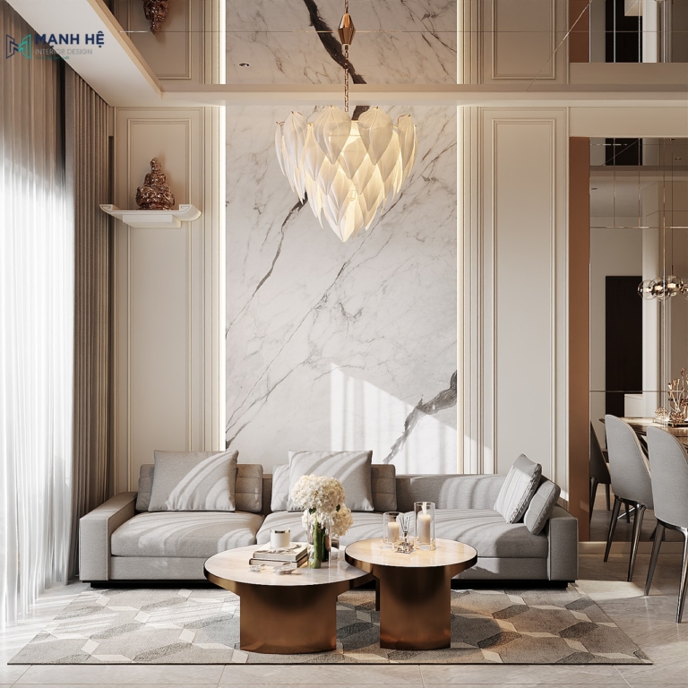 Thiết kế phòng khách - bếp chung cư hiện đại với tone be chủ đạo kết hợp ghế sofa xám và bàn trà tròn thiết kế cách điệu
