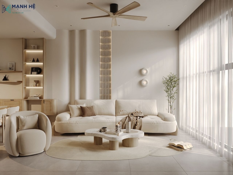 Thiết kế không gian phòng khách nhà phố với gam màu be nổi bật với vách ốp sau sofa được bo cong tỉ mỉ đậm chất Japandi