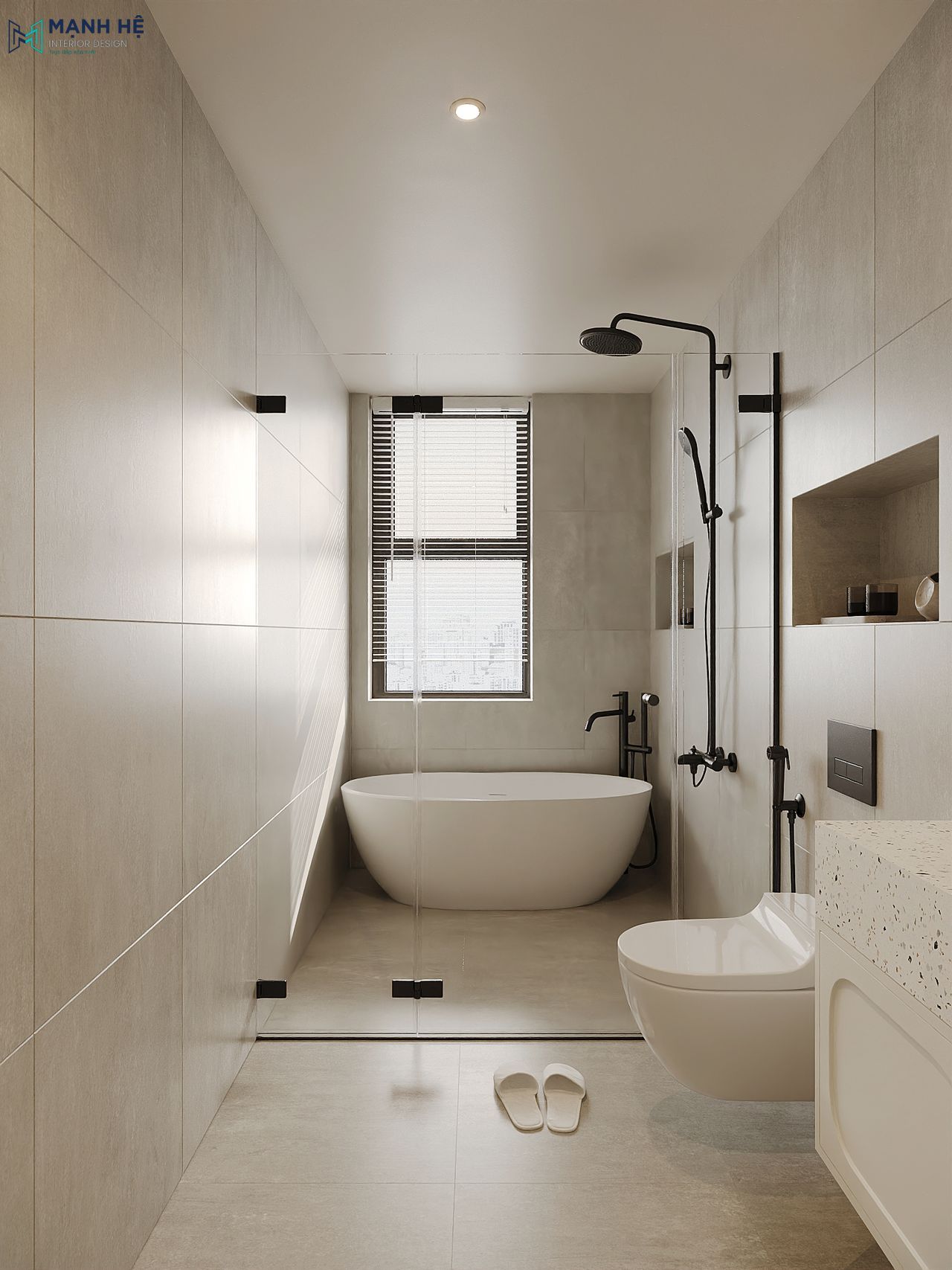 Không gian tắm bố trí bên cạnh cửa sổ và được phân tách khu vực khô và ướt bằng vách kính cường lực trong suốt