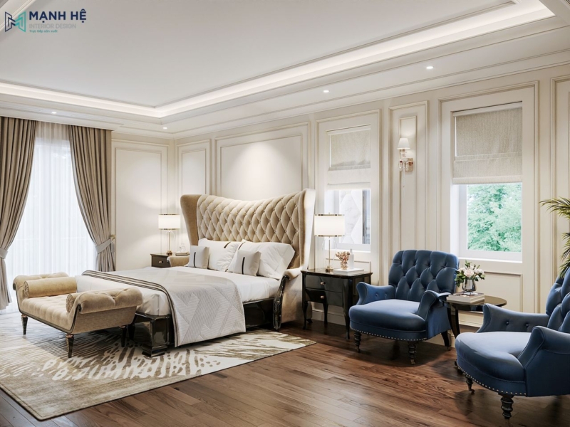 Tổng quan không gian phòng ngủ master mang phong cách tân cổ điển sang trọng nổi bật với góc sofa thư giãn gam màu xanh navy nổi bật