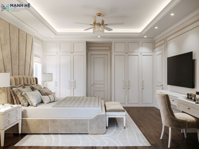 Toàn cảnh phòng ngủ tân cổ điển với tủ kịch trần, giường bọc nệm và thiết kế ánh sáng trần giật cấp