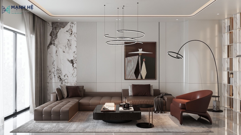 Phòng khách hiện đại với sofa chữ L màu nâu, tranh nghệ thuật và đèn trần thiết kế ấn tượng, tạo cảm giác ấm cúng và đẳng cấp