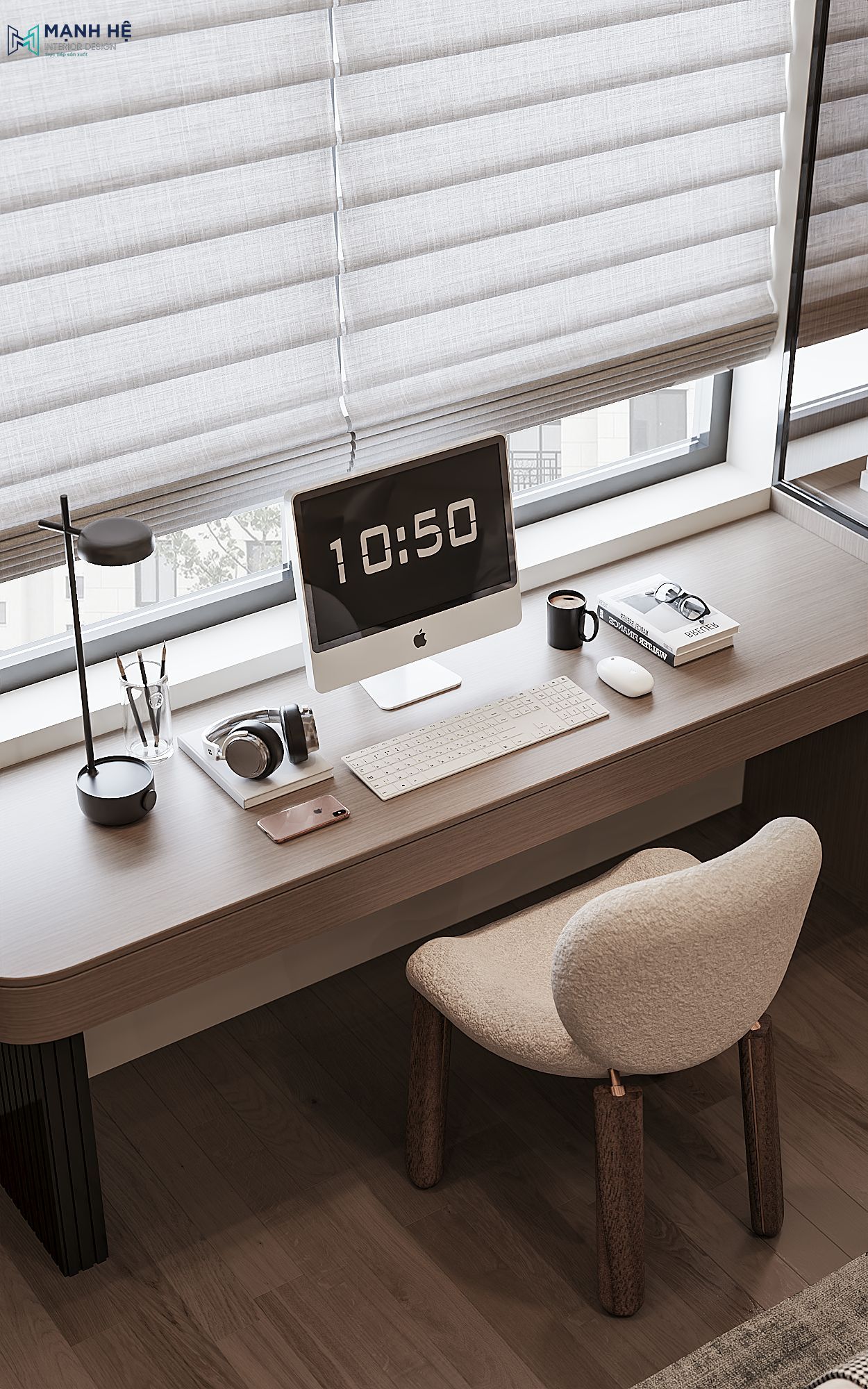 Bàn làm việc được bố trí ngay cửa sổ để đón ánh sáng tự nhiên