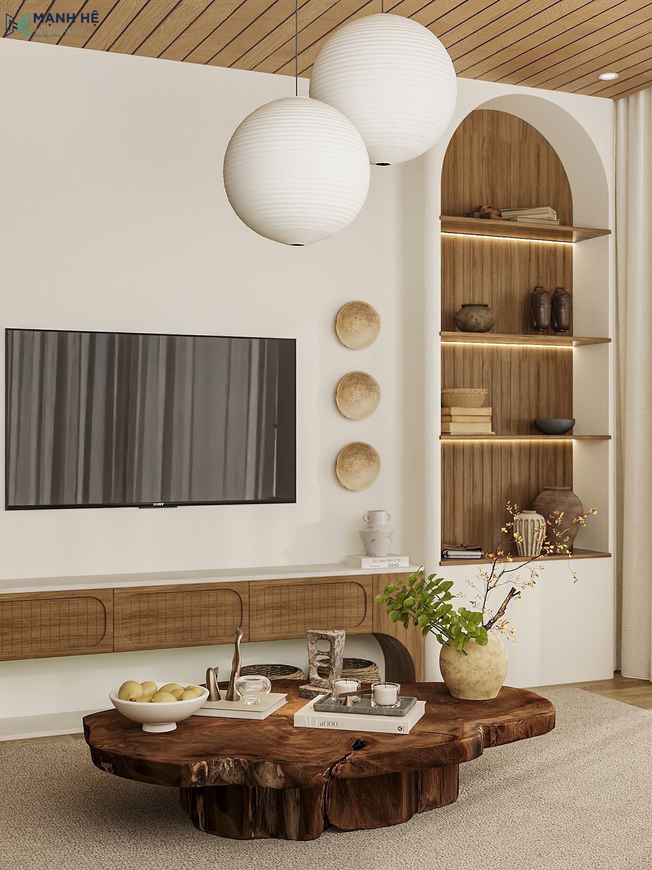 Phòng khách với kệ tivi kết hợp kệ trang trí bo cong, nổi bật với bàn trà gỗ nguyên khối sang trọng