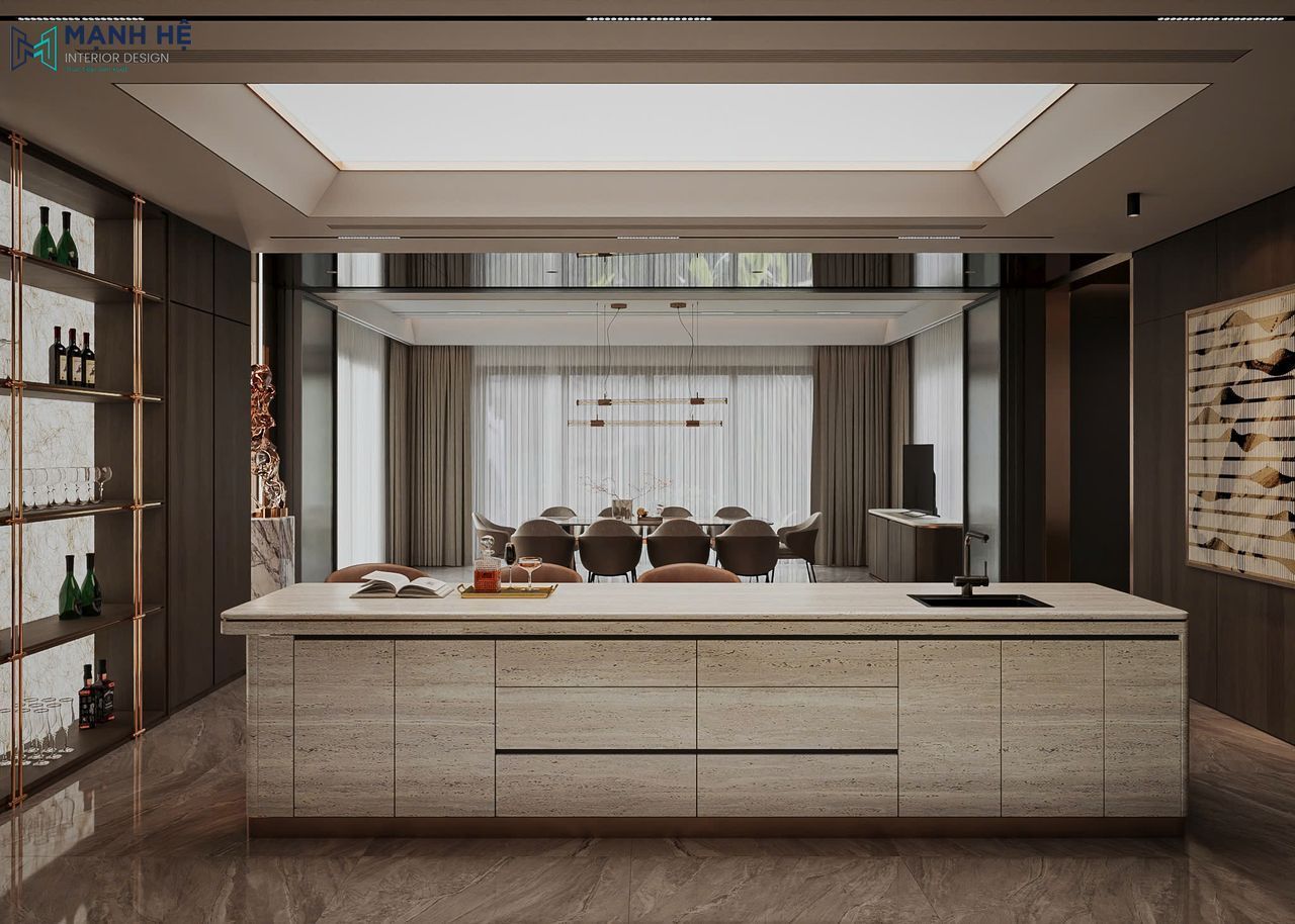 Phòng bếp được thiết kế với đảo bếp dài với các ngăn kéo lưu trữ, kết hợp ánh sáng giếng trời