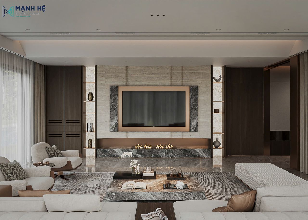 Vách tivi ốp đá vân mây kết hợp ánh sáng hắt, tạo điểm nhấn sang trọng cho phòng khách
