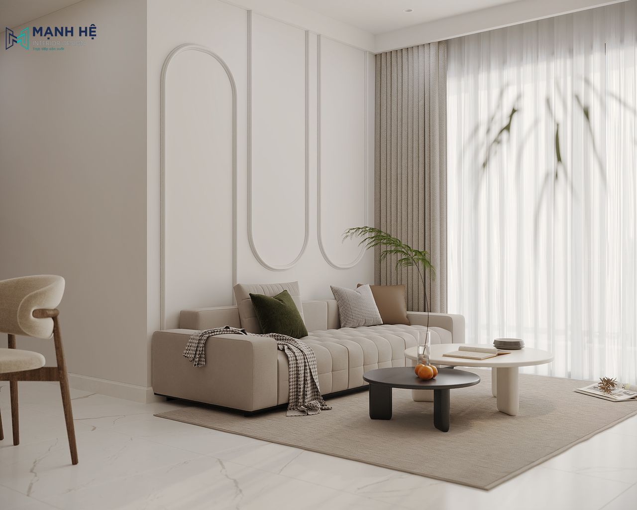 Bộ sofa êm ái cùng bàn trà tròn được bố trí gọn gàng, giúp tối ưu diện tích cho không gian sinh hoạt chung.