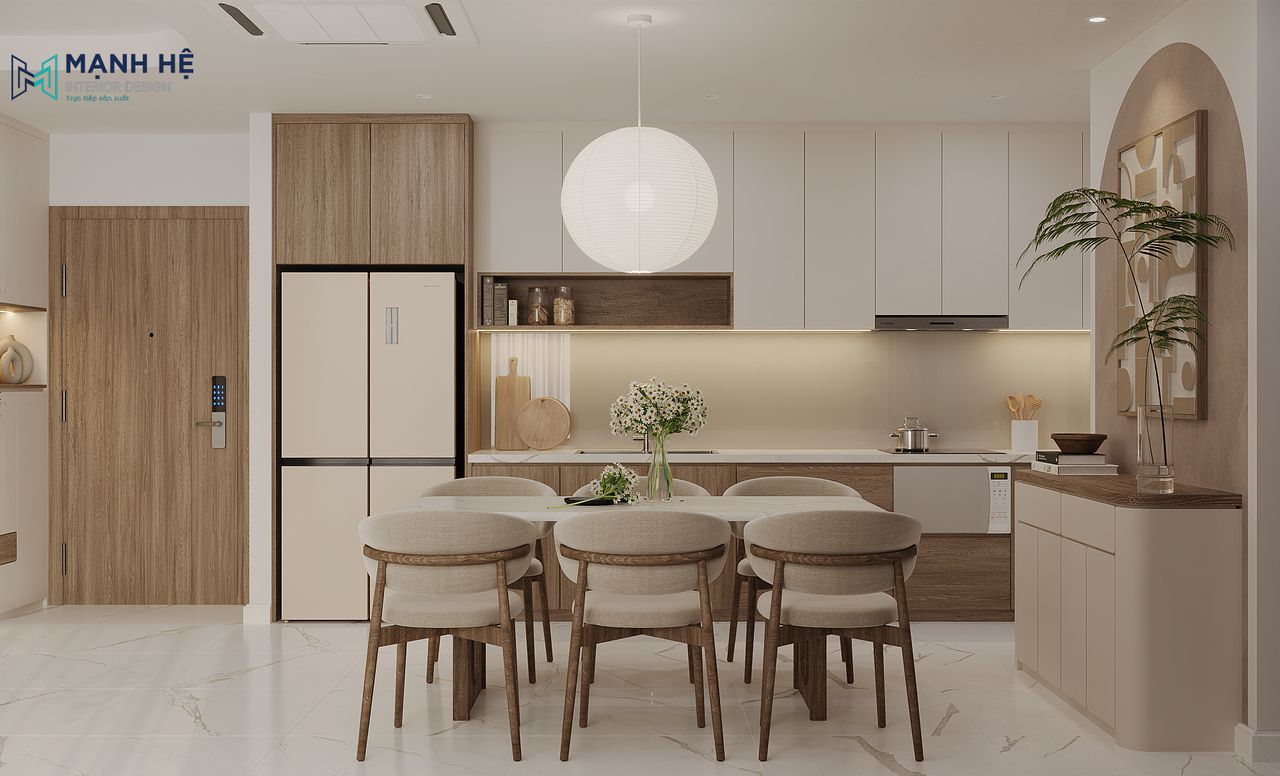 Chiếc đèn thả lồng giấy trở thành tâm điểm của gian bếp, tỏa ánh sáng dịu nhẹ sưởi ấm không gian ăn uống của gia đình.