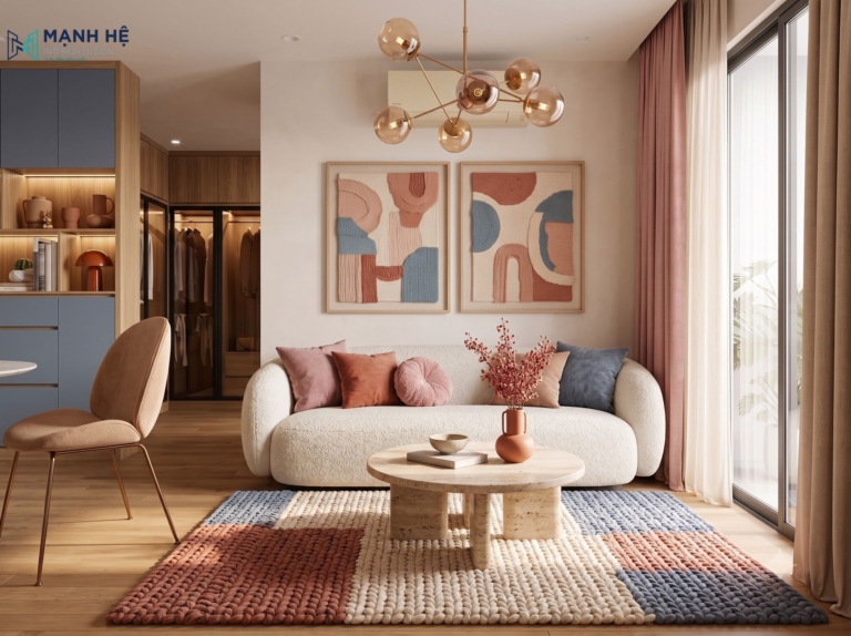 Phòng khách ấm cúng với sofa bọc vải, bàn trà tròn và thảm trải sàn dệt màu sắc nổi bật